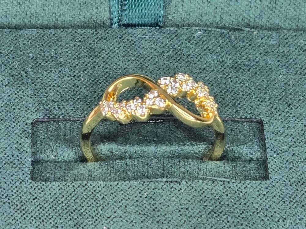 Simply Silver Infinity Style Cubic Zirconia Ring, Size 7